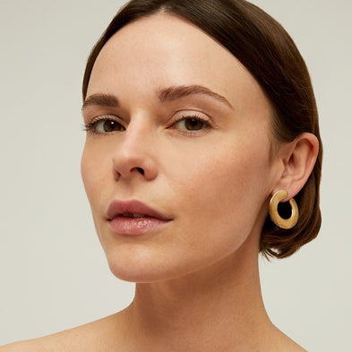 Boucles d'oreilles Poni dorées
